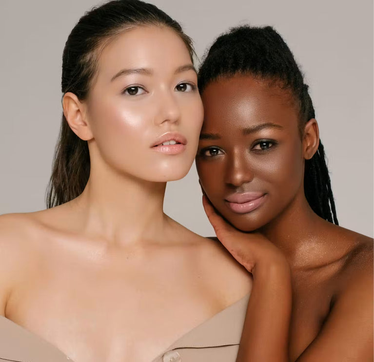 Two women with smooth, glowing skin